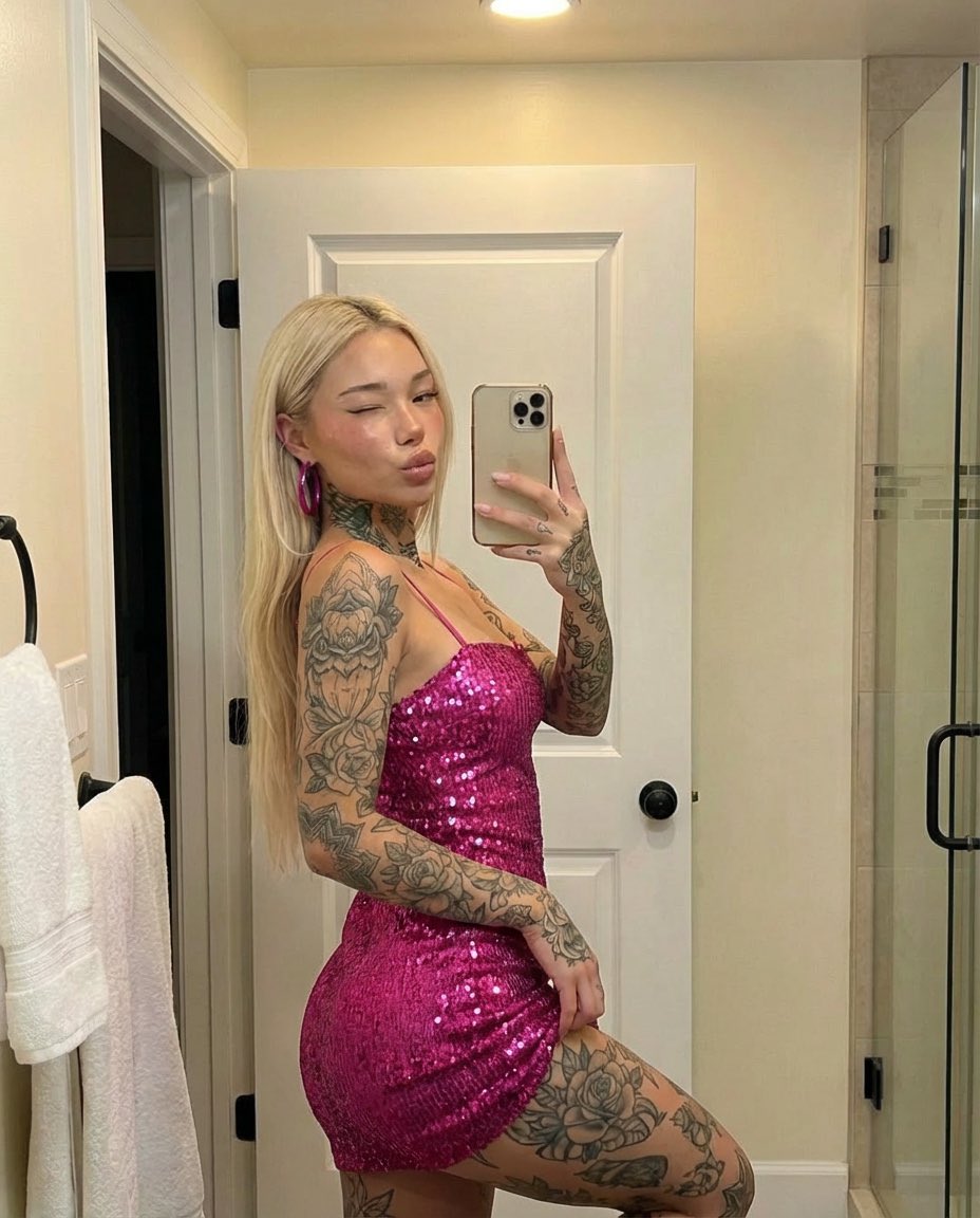 Tattooed Woman Mirror Selfie Prompt — example 1