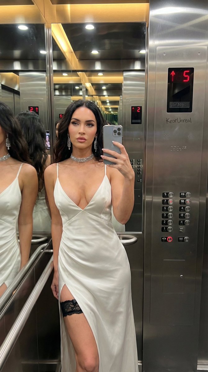 Luxury Elevator Mirror Selfie in Deep V-Neck Dress — example 2