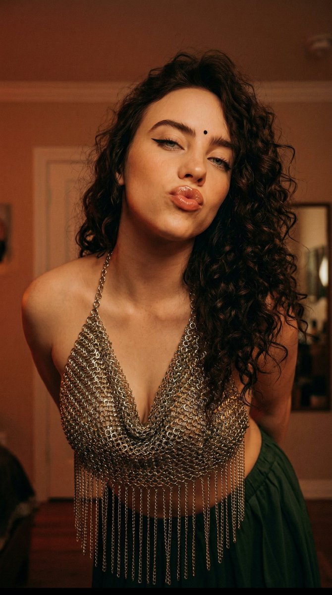 Close-up Portrait with Metallic Chainmail Top — example 2