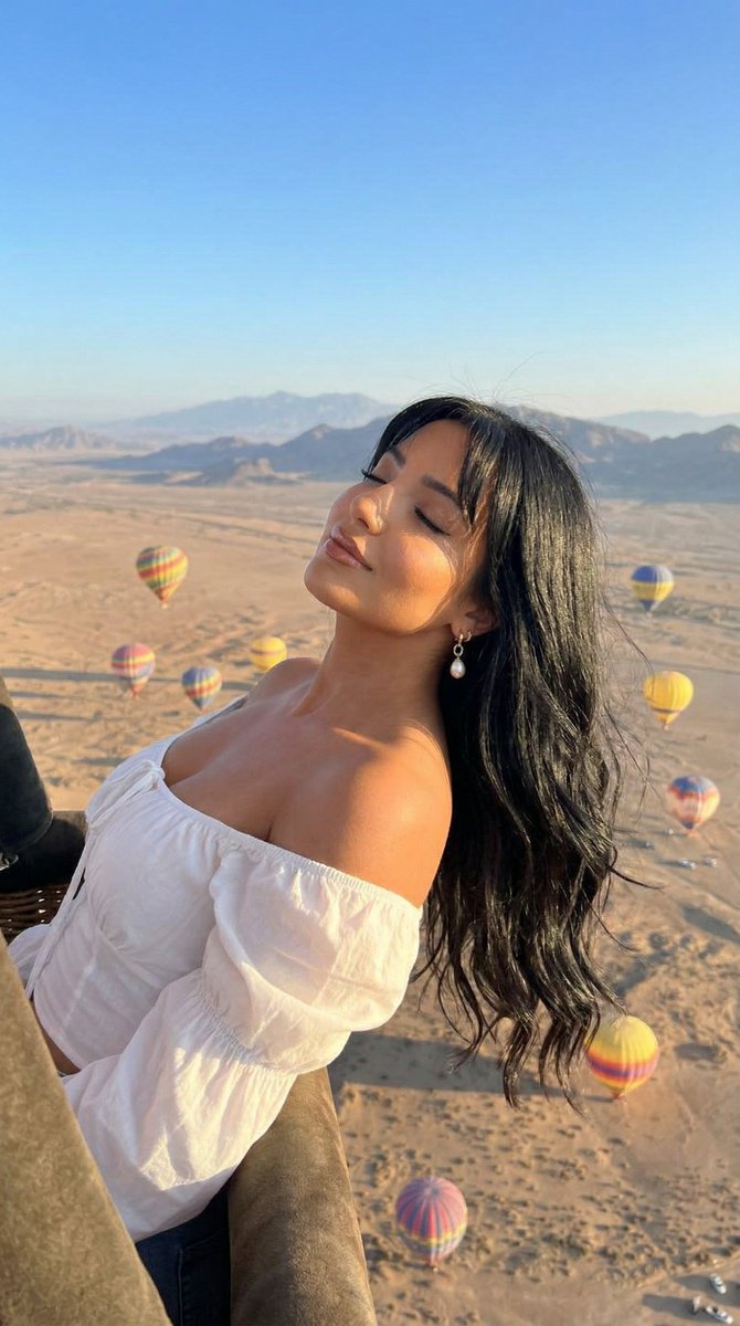 Cinematic Portrait of a Woman in a Hot Air Balloon over a Desert — example 1