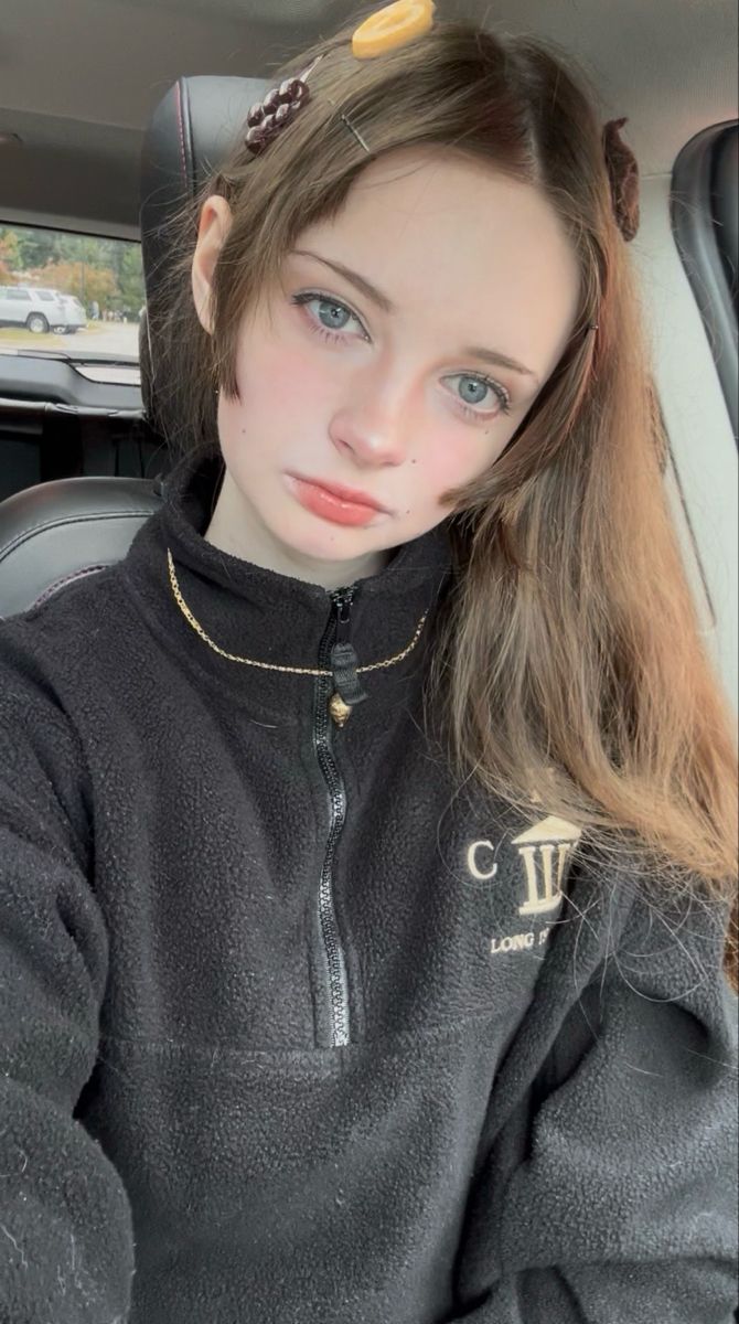 Close-up Candid Selfie Portrait of Young Woman — example 1
