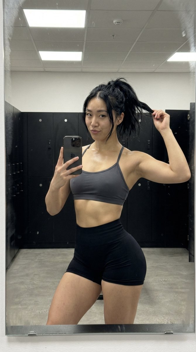Gym Mirror Selfie with Post-Workout Glow (iPhone Style) — example 1
