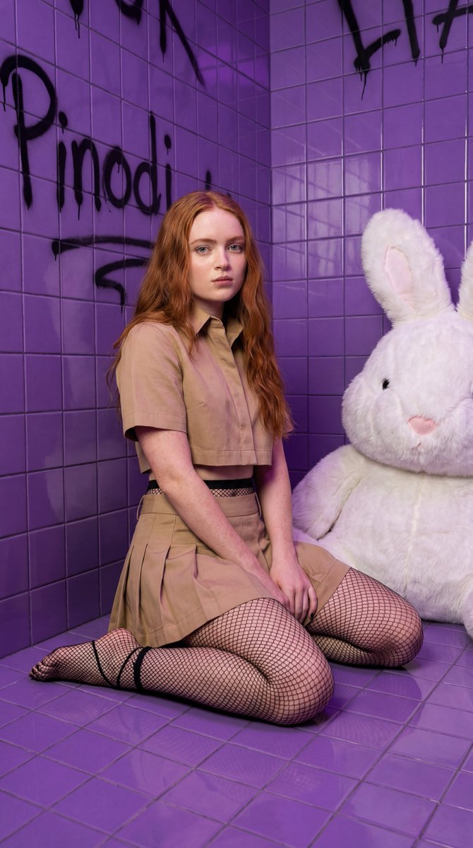 Hyper-realistic portrait of Sadie Sink in a dynamic high-fashion crouch — example 3