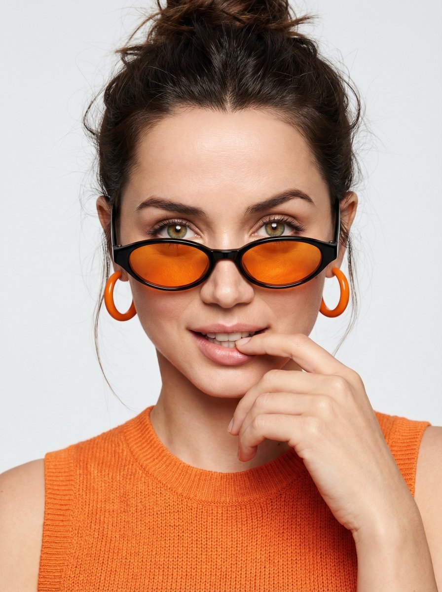 High-fashion editorial portrait with vivid orange accents — example 1