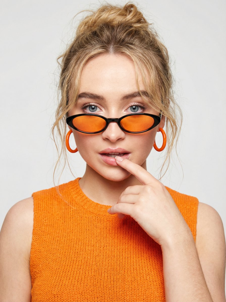 High-fashion editorial portrait with vivid orange accents — example 4