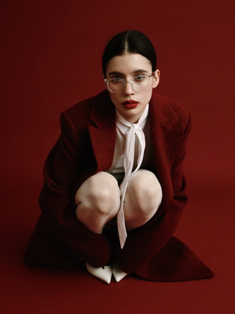High-Fashion Editorial Portrait with Red Background — example 2