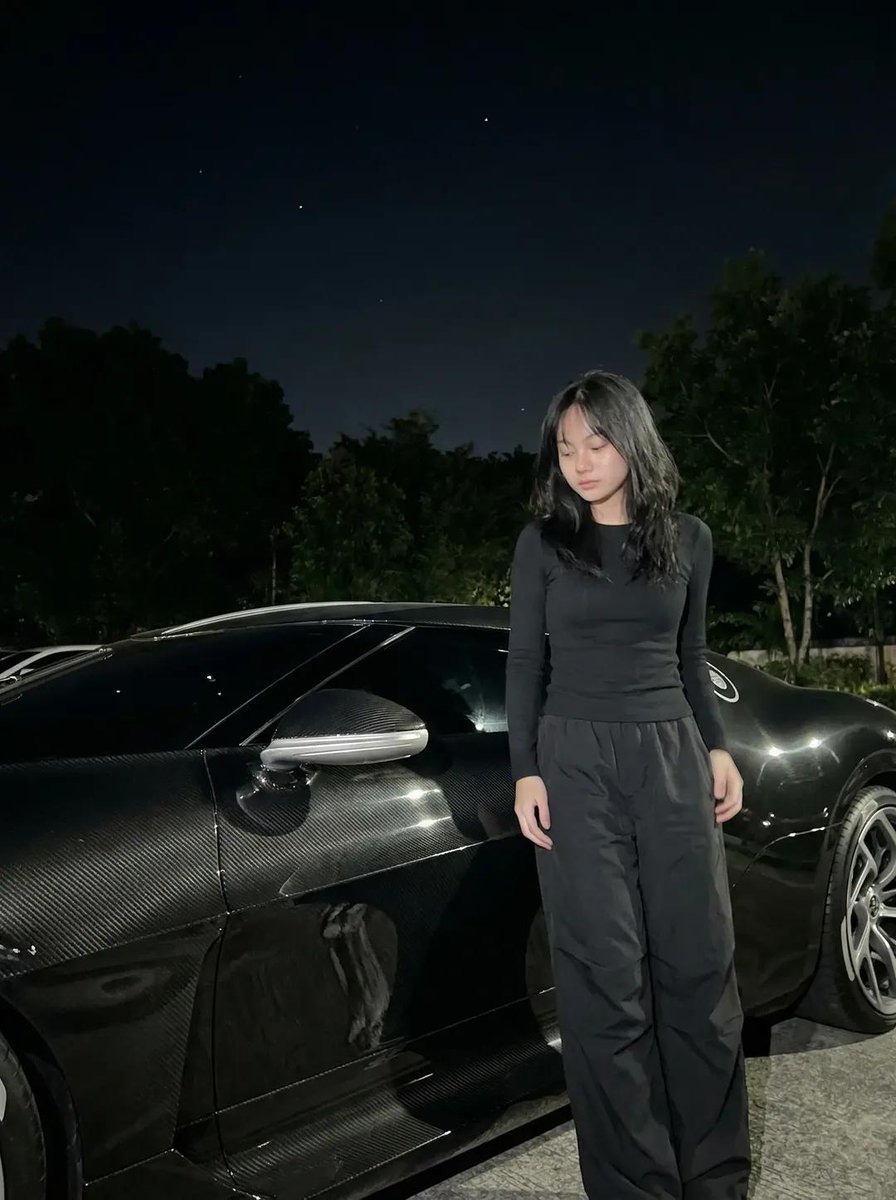 Nighttime Portrait with Luxury Car — example 1