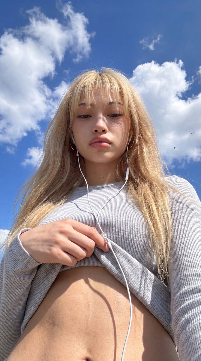 Low-Angle Wide-Sky Smartphone Selfie — example 1