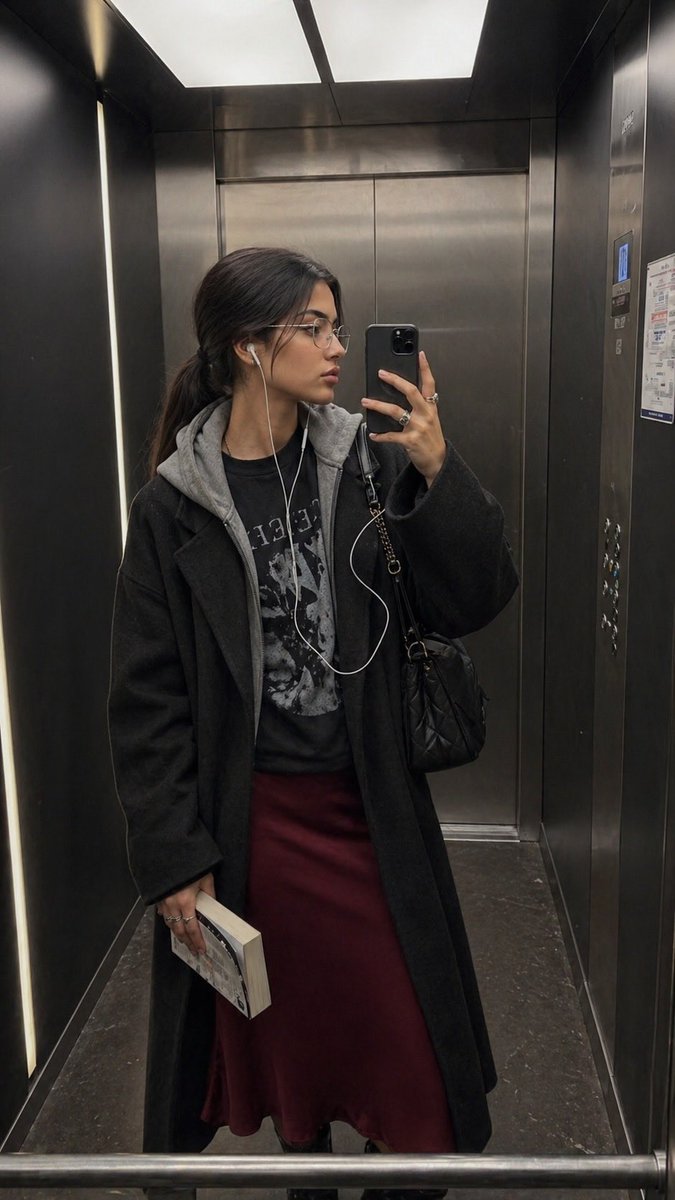 Elevator Mirror Selfie with Book — example 2