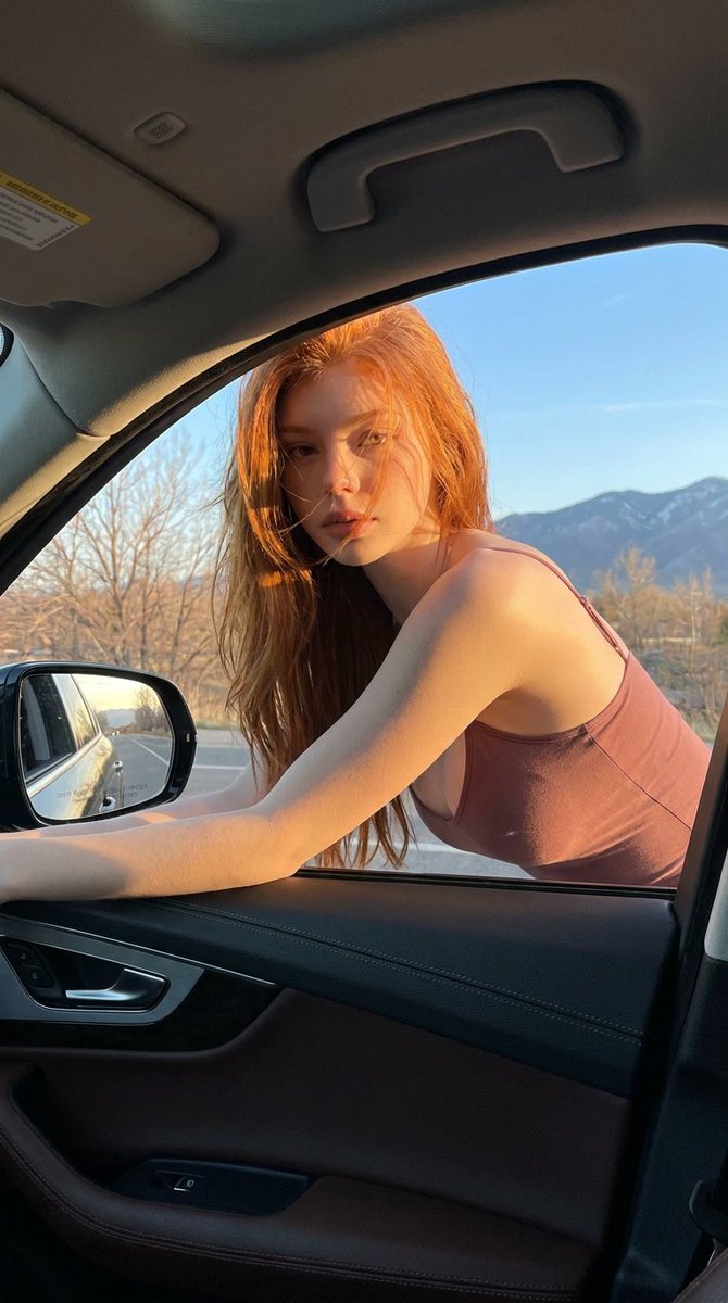 Red-Haired Woman Car Portrait — example 2