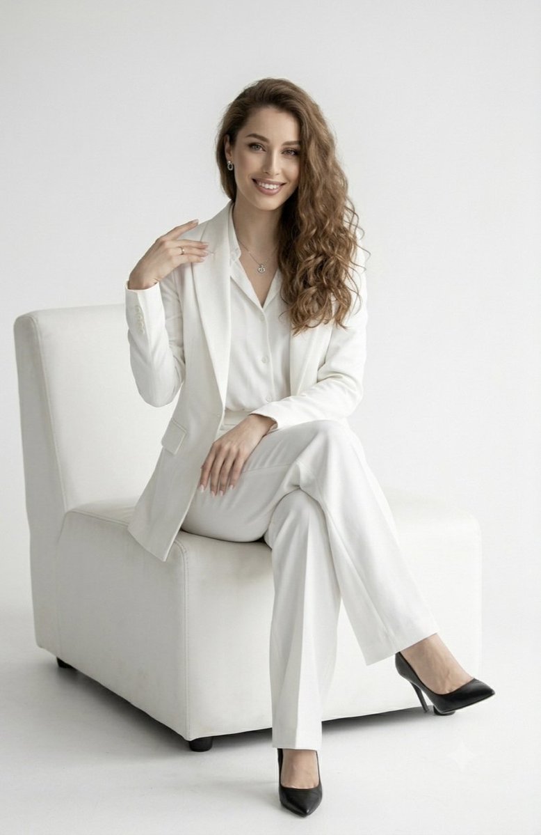 Elegant White Pantsuit Studio Portrait — example 2