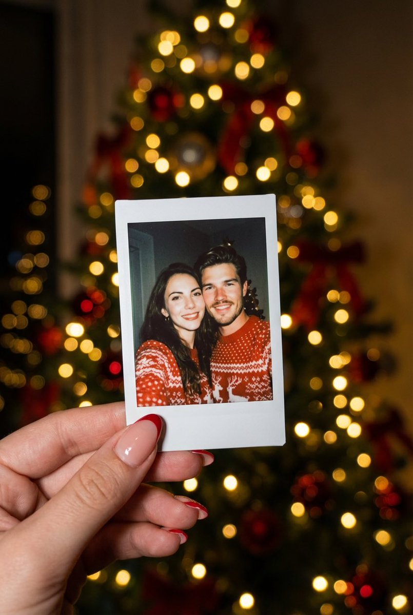 Photorealistic Polaroid Couple Selfie with Christmas Bokeh — example 1