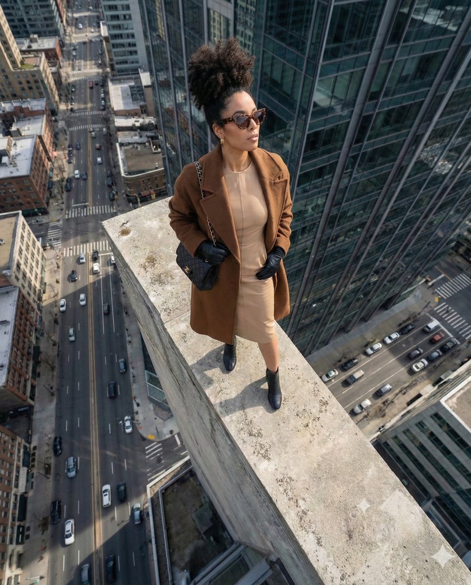 High-Angle Fashion Editorial on Skyscraper Rooftop Ledge — example 2