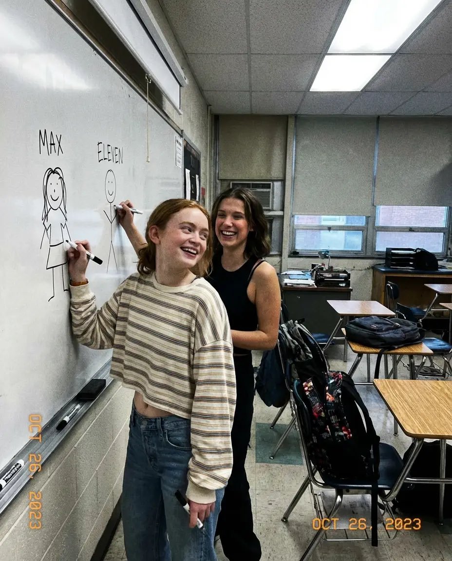 Low-Quality Candid Smartphone Photo of Sadie Sink and Millie Bobby Brown — example 1