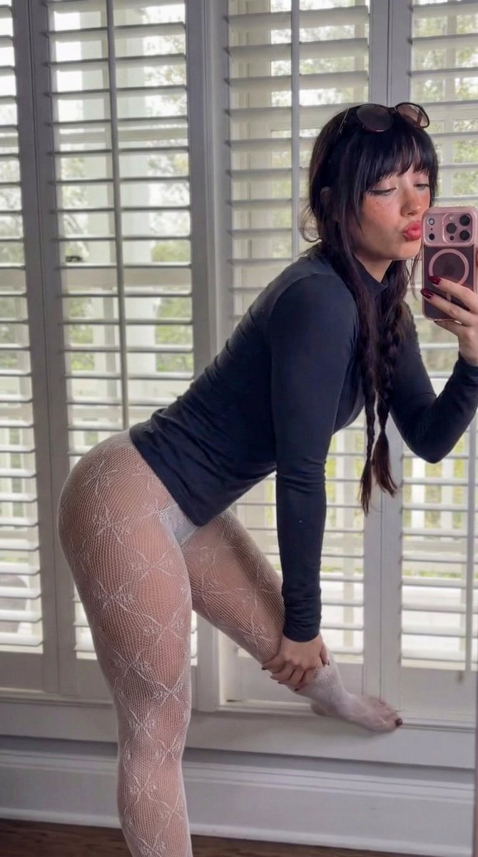 Photorealistic Side-Angle Mirror Selfie with Backlighting — example 1