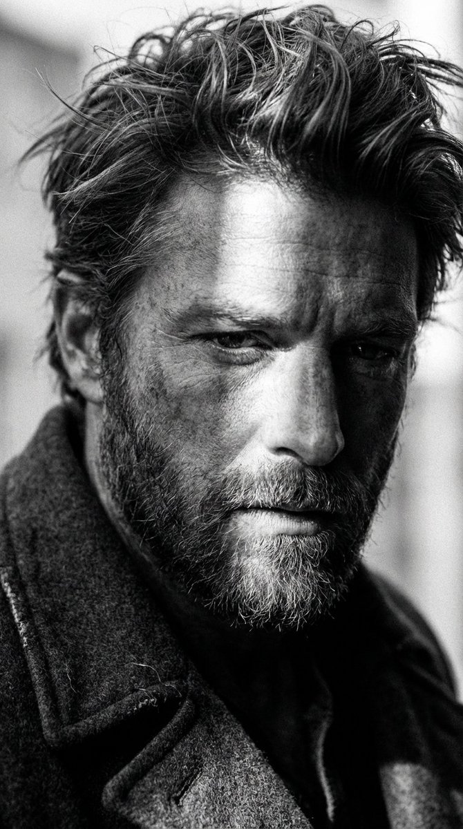 High-Contrast Cinematic Portrait of a Rugged Man — example 1