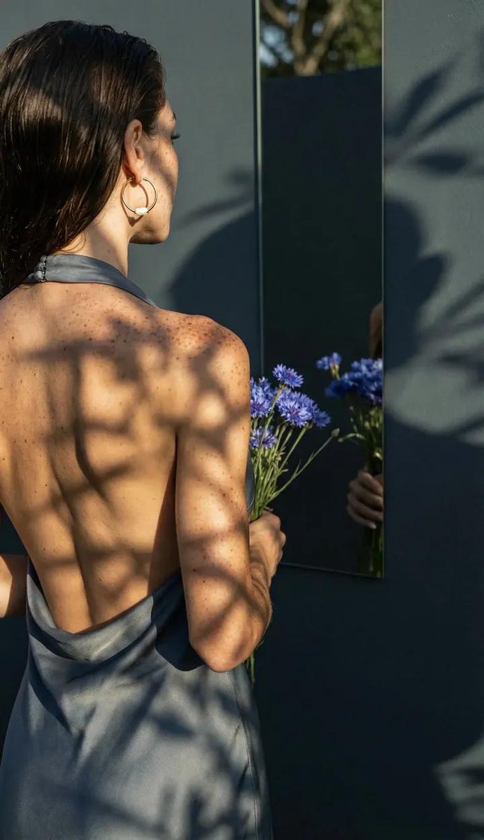Poetic Realism Portrait with Light and Shadow Interplay — example 1