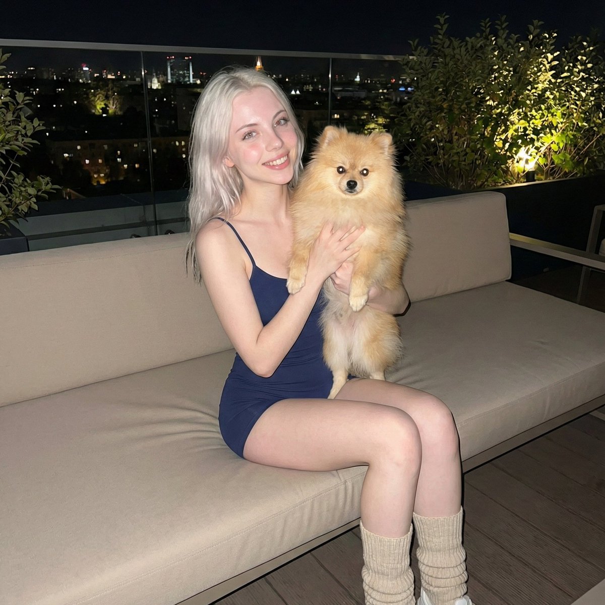 Photorealistic Portrait of Woman Holding a Pomeranian (iPhone Style) — example 1