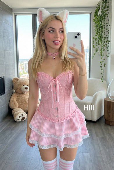 Playful Mirror Selfie with Cat Ears and Pink Brocade Corset — example 1