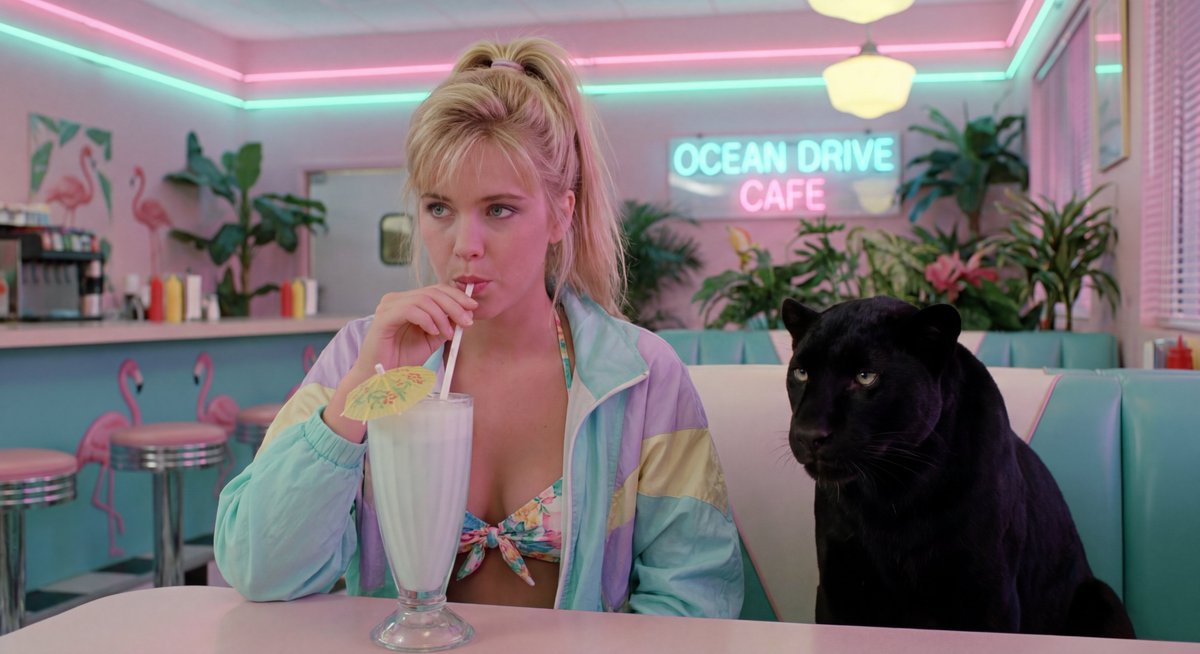 80s Miami diner bikini selfie with panther — example 1