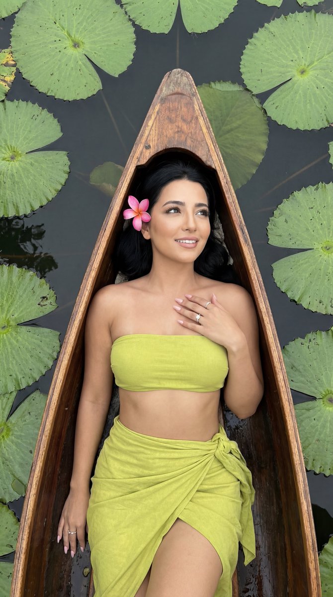Photoreal Top-Down Fashion Editorial on a Boat with Lily Pads — example 1