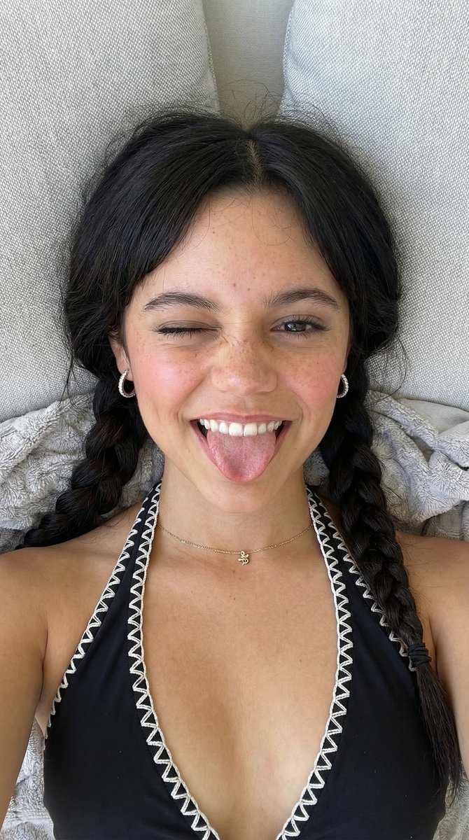 Playful Overhead Portrait with Winking Expression Prompt (Black Hair) — example 2