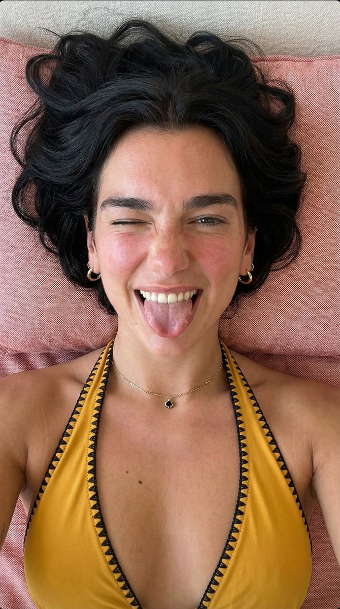 Playful Overhead Portrait with Winking Expression Prompt (Black Hair) — example 3