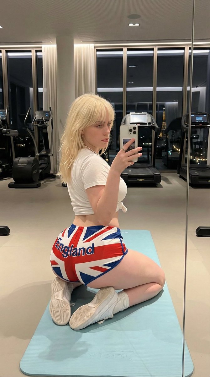 Exaggerated Figure Mirror Selfie of Billie Eilish — example 1