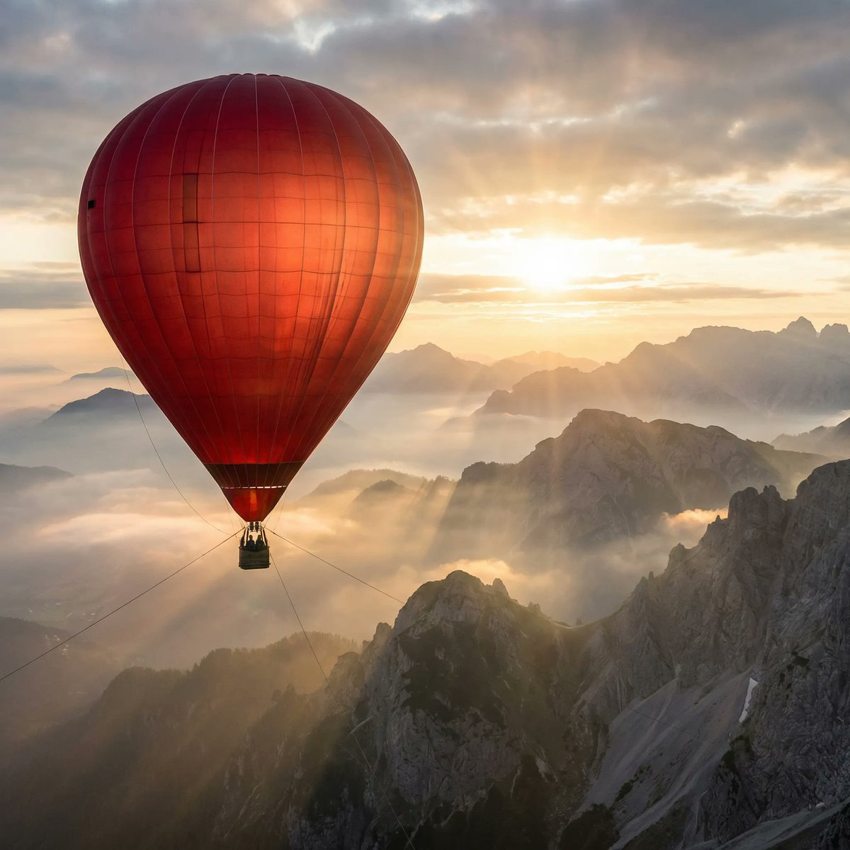 Giant Red Balloon Above Misty Mountains — example 1