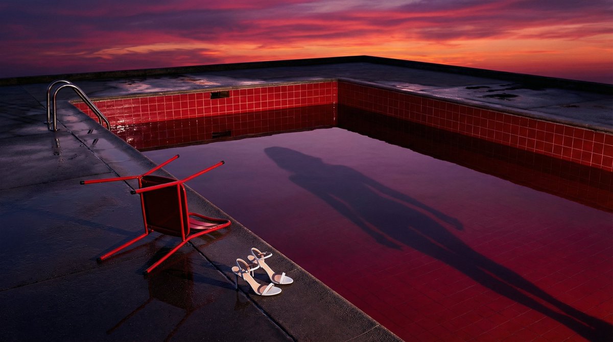 Surreal Guy Bourdin Style Pool Scene — example 1