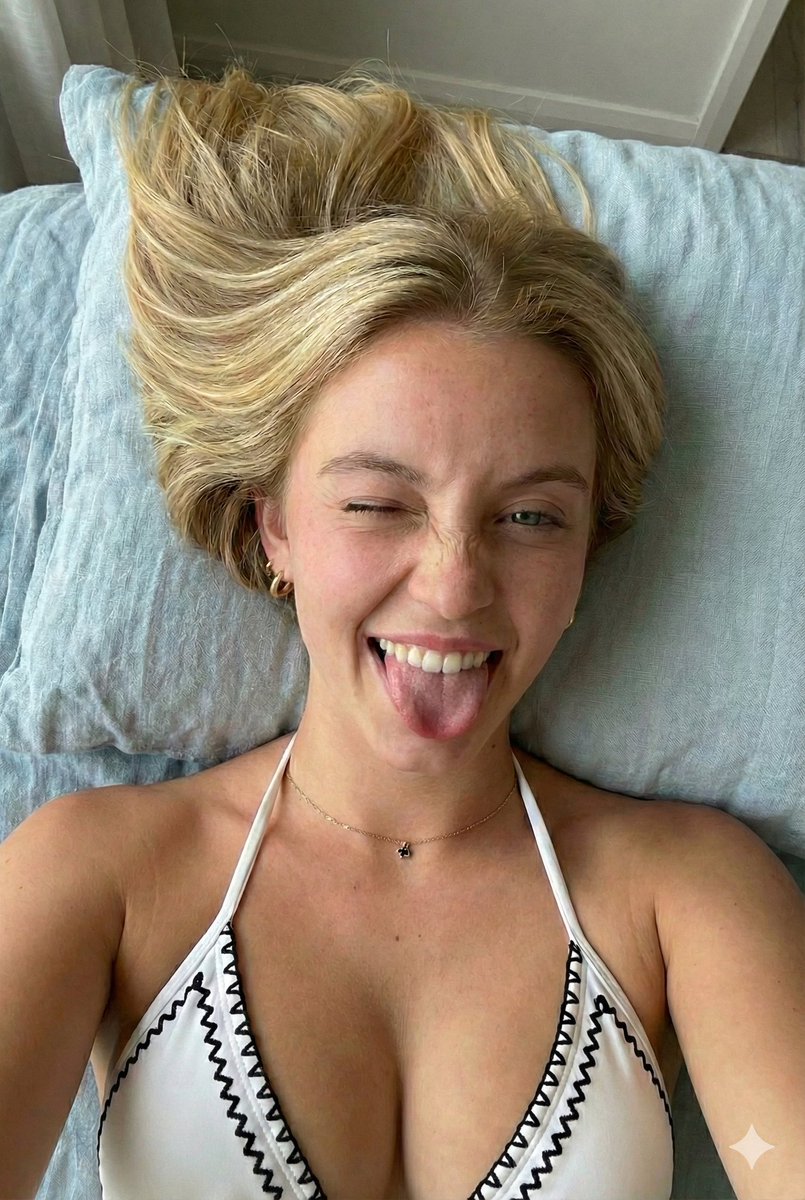 Close-up Portrait of a Playful Young Woman Lying Down — example 2