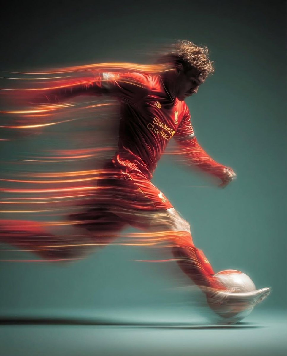 Panning shot of a soccer player kicking a ball — example 2