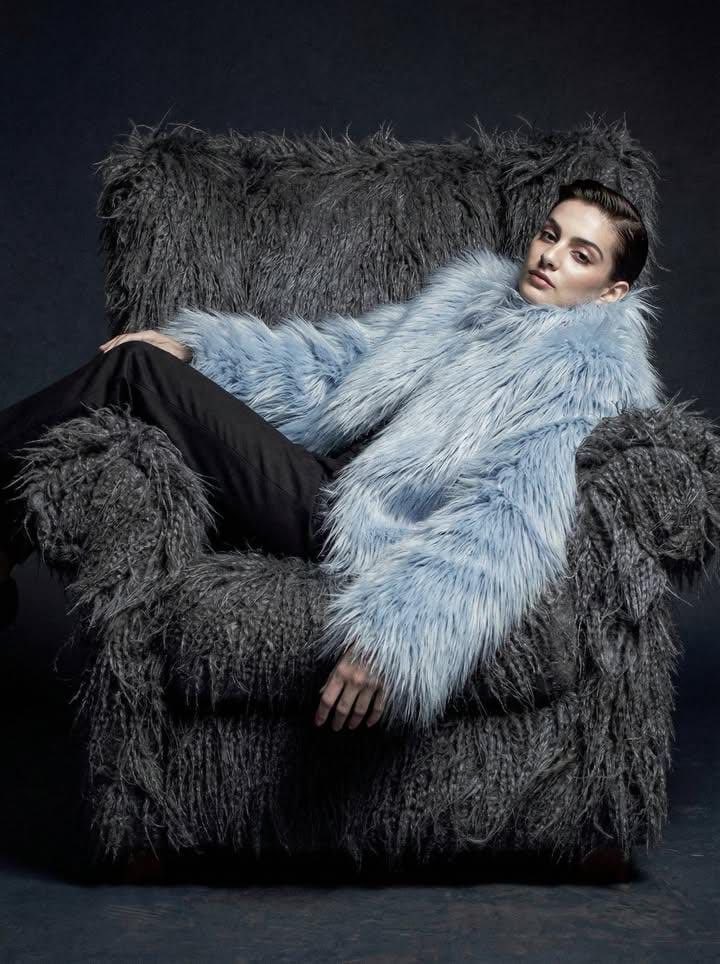 Ultra-high fashion editorial portrait in faux-fur coat — example 3