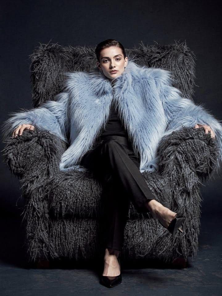 Ultra-high fashion editorial portrait in faux-fur coat — example 4