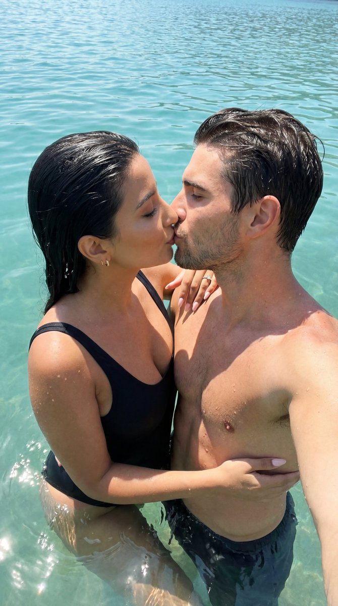 Ultra-Photorealistic Candid Water Kiss — example 1