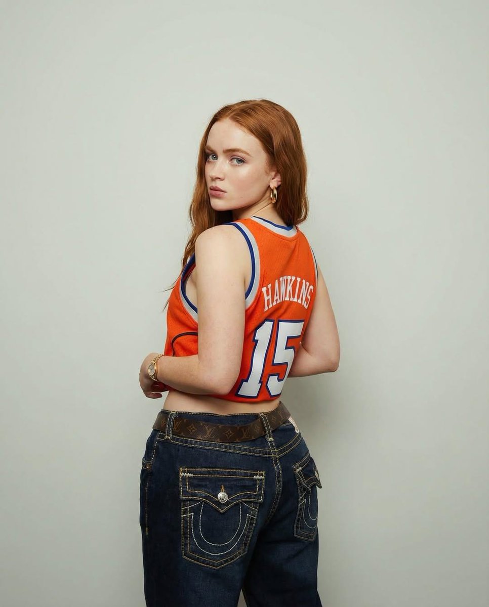 Y2K Streetwear Portrait of Sadie Sink in a Locker Room — example 2