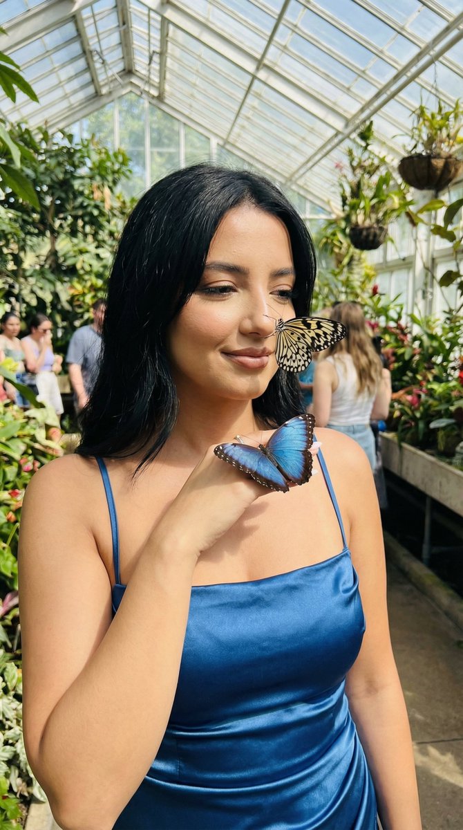 Photoreal Cinematic Portrait in Butterfly Garden Prompt — example 1