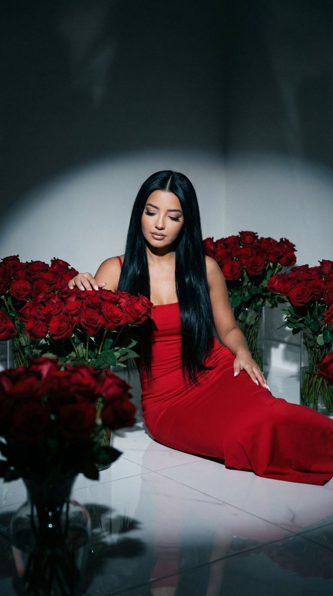Cinematic Low-Key Portrait in Red Rose Room — example 1